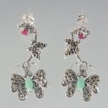 A PAIR OF SILVER RUBY EMERALD AND MARCASITE BUTTERFLY DROP EARRINGS.