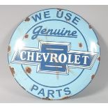 A NOVELTY CIRCULAR ENAMEL SIGN "Chevrolet" 12ins diameter