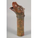 AN 18TH-19TH CENTURY INDIAN GLAZED POTTERY WATER SPOUT in the form of a Makkara dragon, 28cm long.