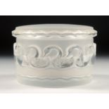 A LALIQUE GLASS CIRCULAR BOX AND COVER the sides modelled as a continuous band of swans. 4ins