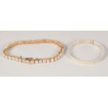 A BABY'S SILVER BRACELET AND A LINE BRACELET (2).