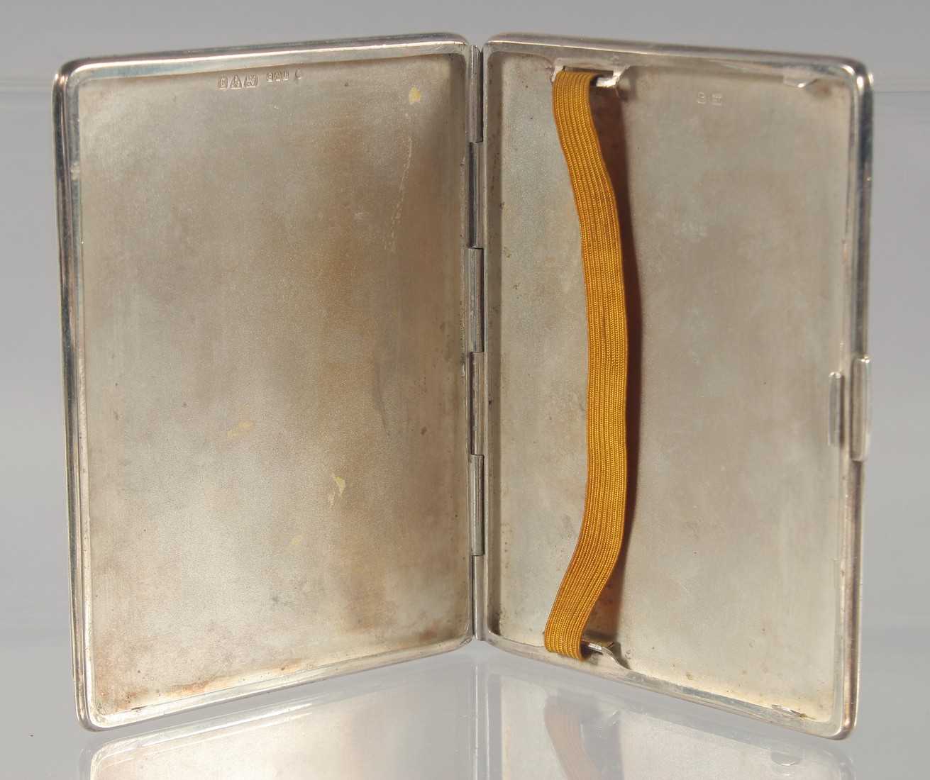 A SILVER CIGARETTE CASE, Chester 1934, the front and back decorated with scenes of a polo match, - Image 5 of 8