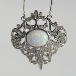 A SILVER OPAL PENDANT AND CHAIN.