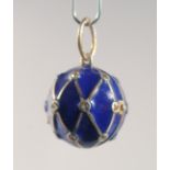 A SILVER AND BLUE ENAMEL BALL SHAPED LOCKET. 2cm diameter