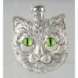 A CAT'S FACE SCENT BOTTLE, with glass eyes. 5.5cm