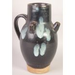 AN UNUSUAL CHINESE POTTERY EWER OR JUG.