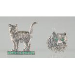 TWO SILVER CAT BROOCHES.