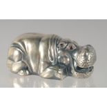 A RUSSIAN CAST SILVER MODEL OF A RECUMBENT HIPPO, Faberge mark.