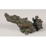 A JAPANESE BRONZE OKIMONO OF A DRAGON, the base with character mark, 8cm wide.