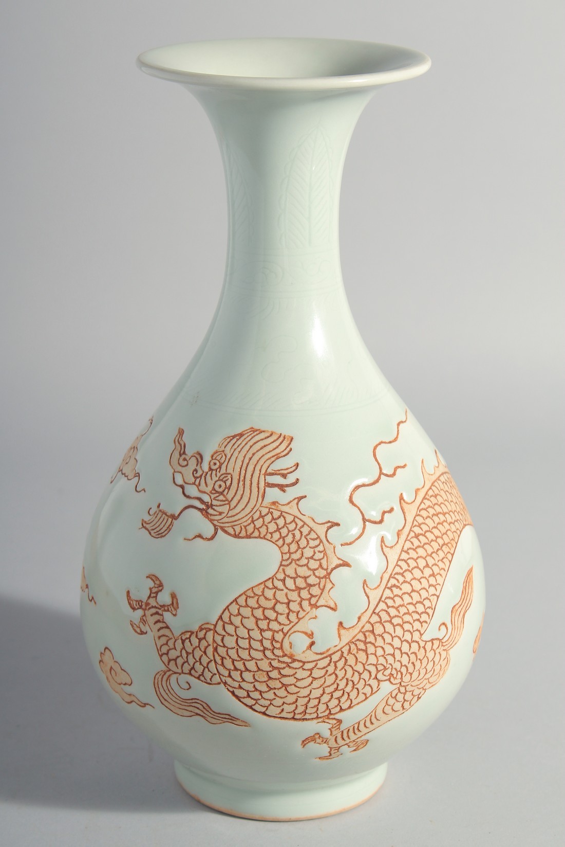 A CHINESE PART-GLAZE YUHUCHUN VASE, decorated with unglazed dragon. 27cm high.