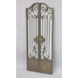 A WROUGHT IRON GATE STYLE FOLDING MIRROR. Open size 4ft 11ins high x 4ft wide.