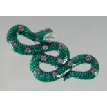 A SILVER AND ENAMEL RUBY SNAKE BROOCH/PENDANT.