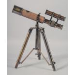 A SMALL TELESCOPE ON A TRIPOD BASE. 12ins high.