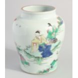 A CHINESE FAMILLE VERTE PORCELAIN VASE, painted with figures by water. 16cm high.