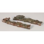 A PAIR OF BRONZE PAPERWEIGHTS, one formed as an insect on bamboo, the other as a frog on bamboo,