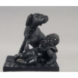 A BRONZE GROUP, A CHILD AND DOG. 5ins.
