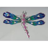 A SILVER RUBY AND PEARL DRAGON FLY BROOCH.