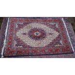 A GOOD PERSIAN CARPET, cream ground with all over floral decoration. 9'6" x 6'8"