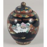 A JAPANESE CLOISONNE JAR AND COVER. 11cm high.