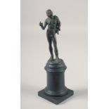 AFTER THE ANTIQUE, A BRONZE MALE NUDE. 5ins on a plinth.