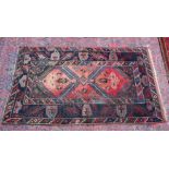 A PERSIAN CARPET, pale pink central ground with stylised geometric decoration. 6'7" x 4'0"