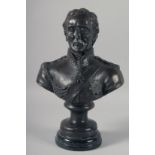 A BRONZE BUST OF WELLINGTON on a marble base. 13ins high.