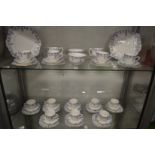 A good Royal Albert wisteria tea service comprising twelve cups, saucers and plates, pair of sugar