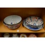 Four 19th century and later Oriental bowls and dishes (faults).
