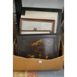 A box of paintings and prints.