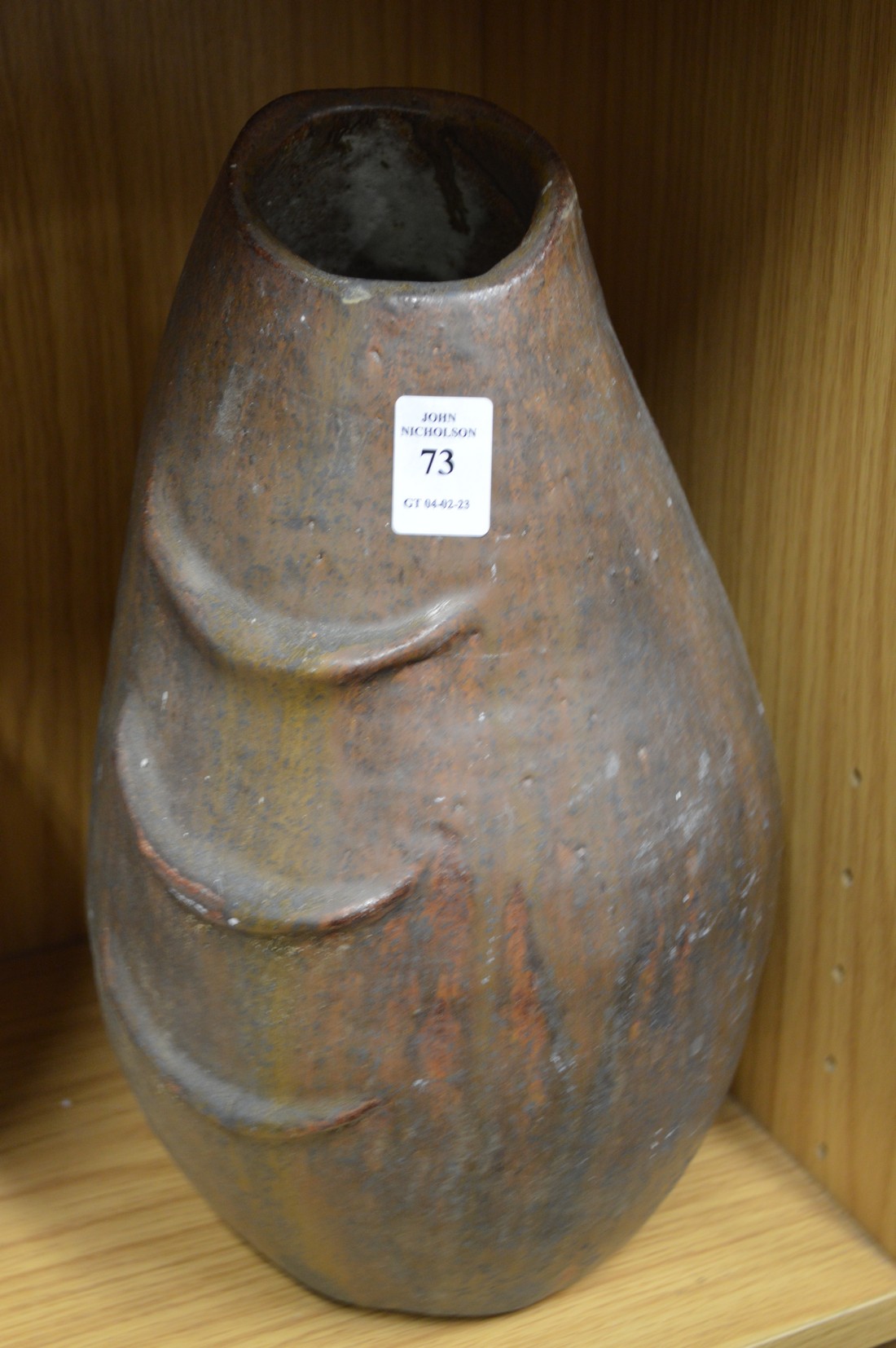 An unusual large pottery vase.