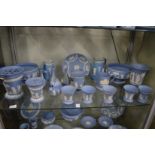 A good collection of Wedgwood pale blue jasperware to include bowls, jugs, vases etc.