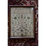 A 19th century sampler by Anne Collins aged 10 years dated July 22nd 1850.