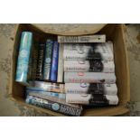 A box of first editions to include John Grisham etc.