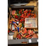 A collection of various shotgun cartridge cases etc.