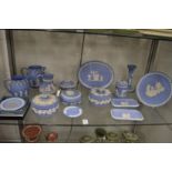 A good collection of Wedgwood pale blue jasperware to include boxes and covers.