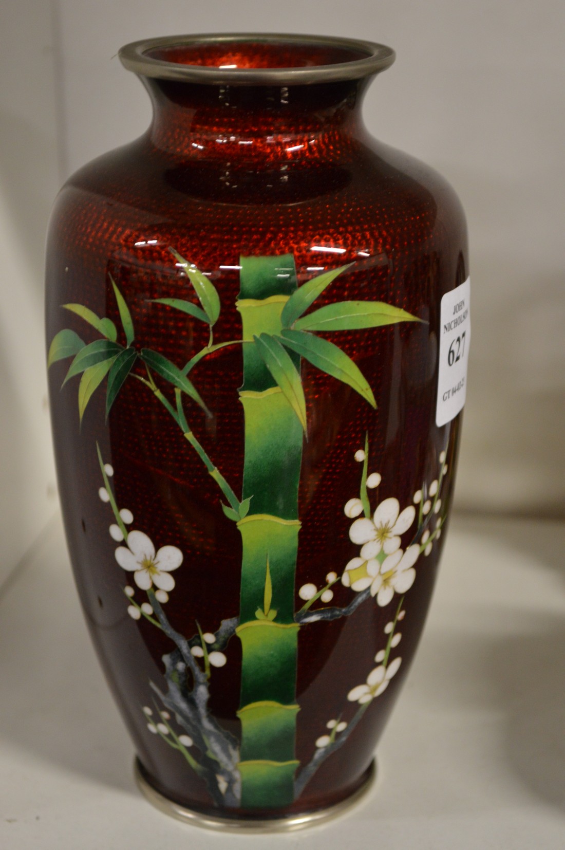 A Japanese cloisonne vase (bruise to the shoulder).