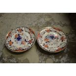 A pair of ironstone warming dishes.