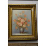 Still life of flowers in a vase, oil on board, in a decorative gilt frame.