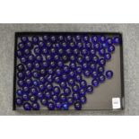 A quantity of blue glass beads.