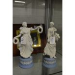 A pair of Wedgwood jasperware figures of classical young ladies.