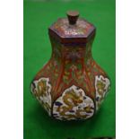 An unusual small cloisonne hexagonal shaped jar and cover.