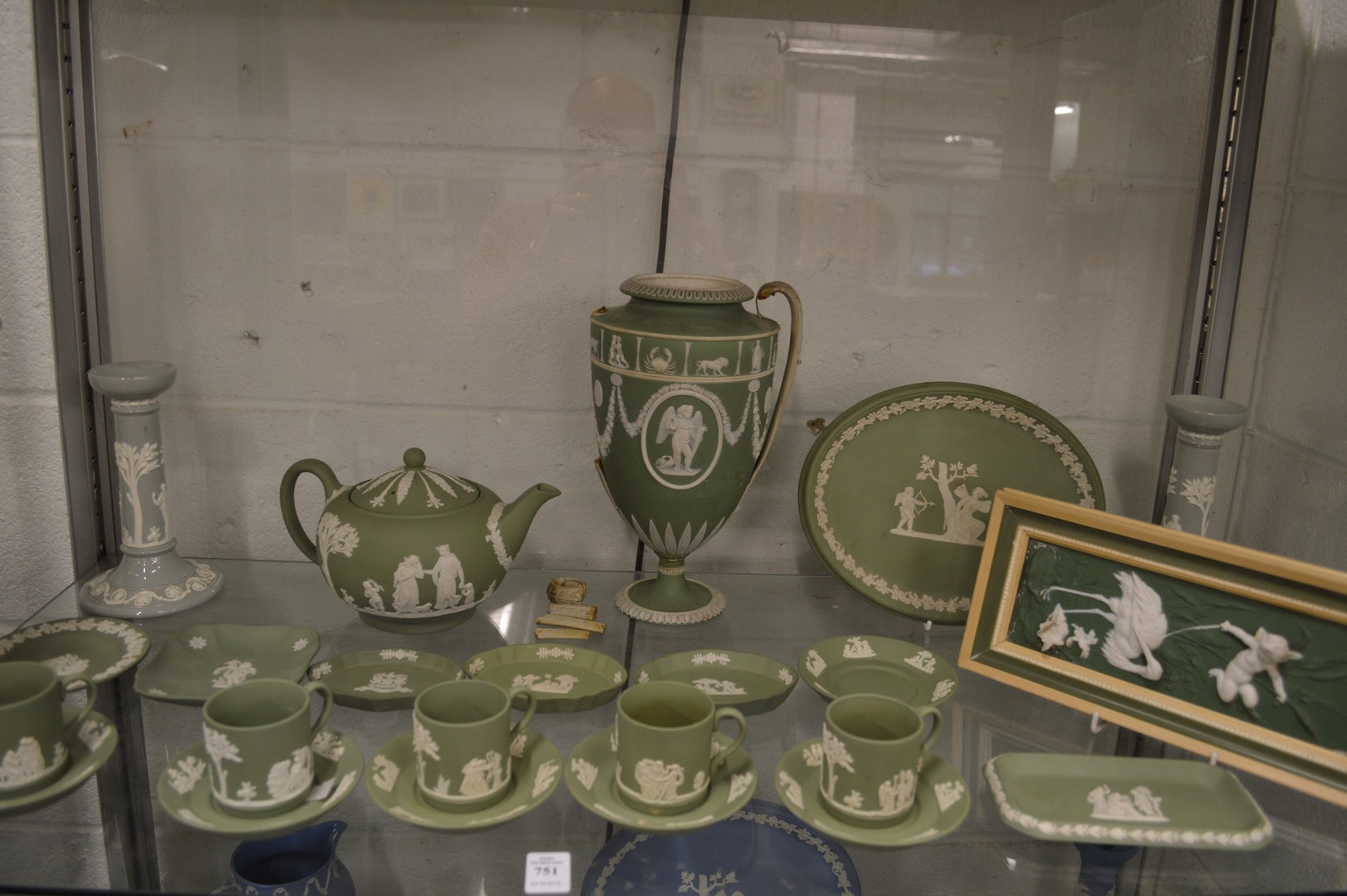 A good collection of Wedgwood green jasperware to include a pedestal vase (handle af).