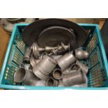 A collection of pewter tankards etc.