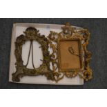 Two decorative photograph frames.