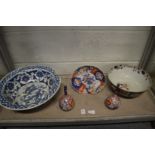 A Chinese blue and white bowl, imari china, another bowl (af).