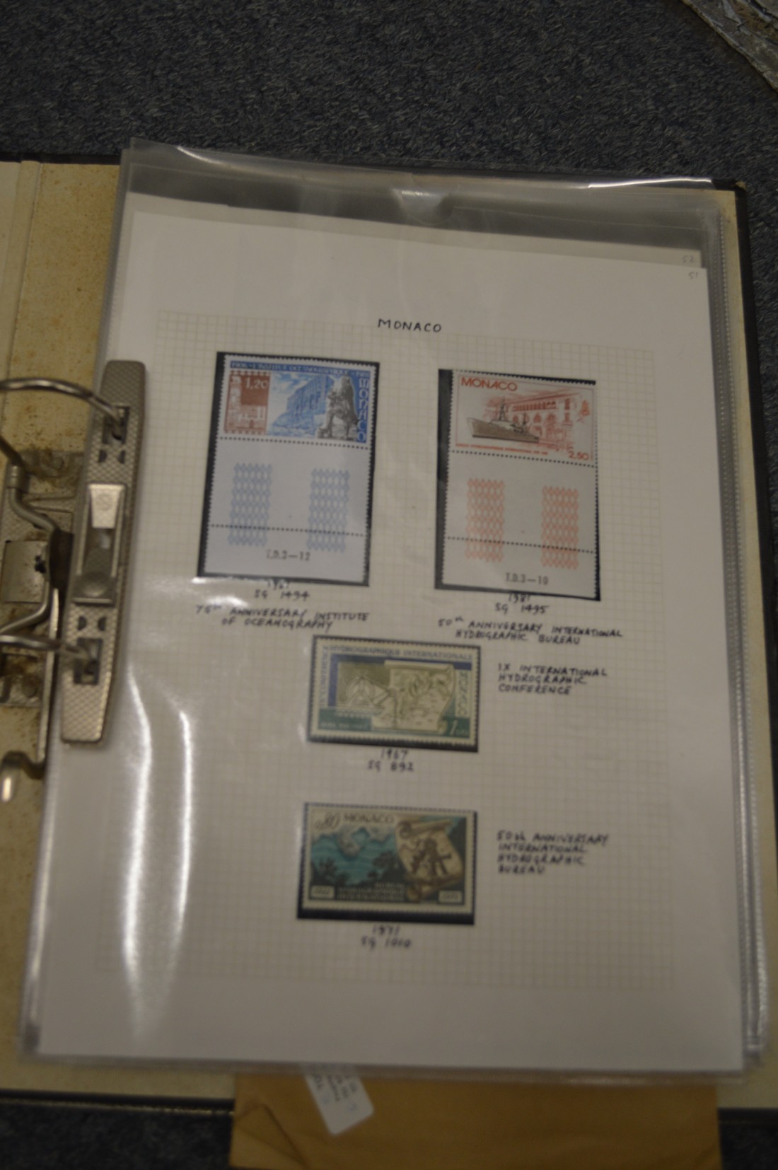 A red Simplex stamp album and two ring binders containing numerous stamps with annotated notes by - Image 2 of 11