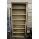 An Oka green painted free standing bookcase.