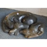 Ronnie Dongo, a carved stone sculpture of a deer and fawn asleep.