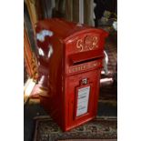 A reproduction cast iron post box.