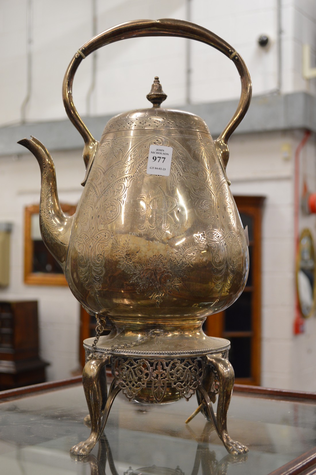 A Victorian engraved silver kettle on stand, London 1872 maker Stephen Smith.